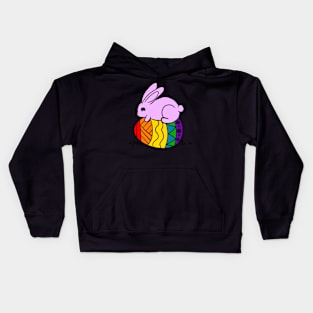 Pink bunny hiding behind orange blue egg Kids Hoodie